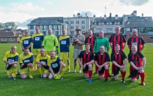 The Ref and The Players - The North (in Red/Black) The South (in Yellow/Blue)